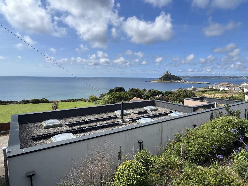 Lot: 125 - DETACHED HOUSE WITH VIEWS ACROSS MOUNT'S BAY AND ST MICHAEL'S MOUNT - Ariel view